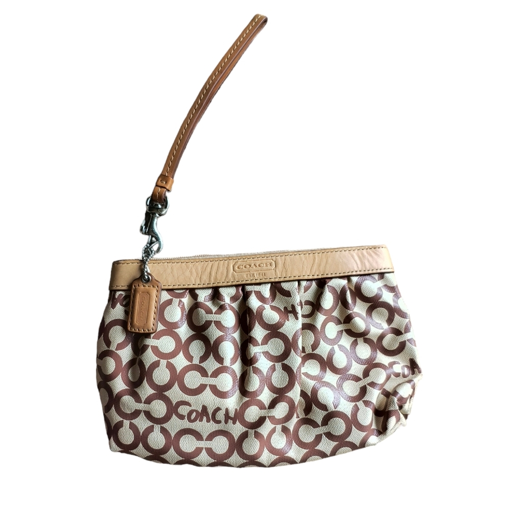 Vintage coach wristlet in beige and brown colors B17